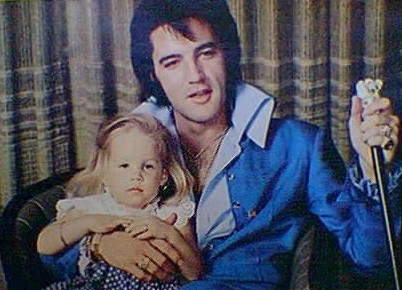 Elvis Presley - with little Girl/Stock